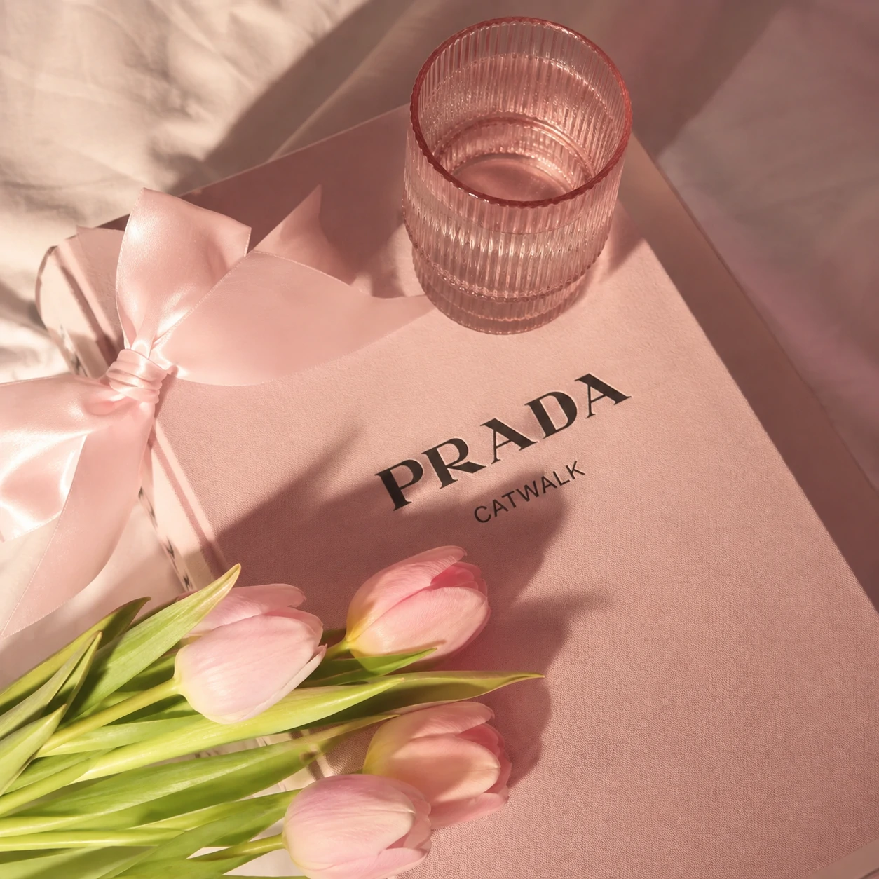 Preppy Instagram pfp with a soft pink blush wash, warm lighting, and clean profile styling
