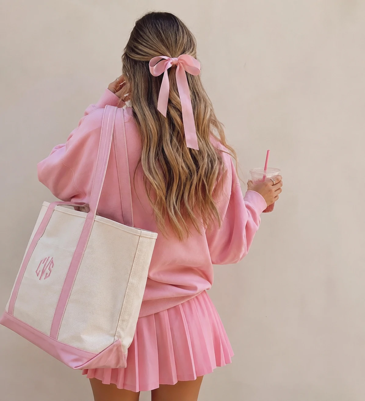 Preppy no face pfp with back turn pose, pink outfit, and a soft neutral backdrop